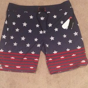 Men’s Travis Mathew patriotic swim trunks.